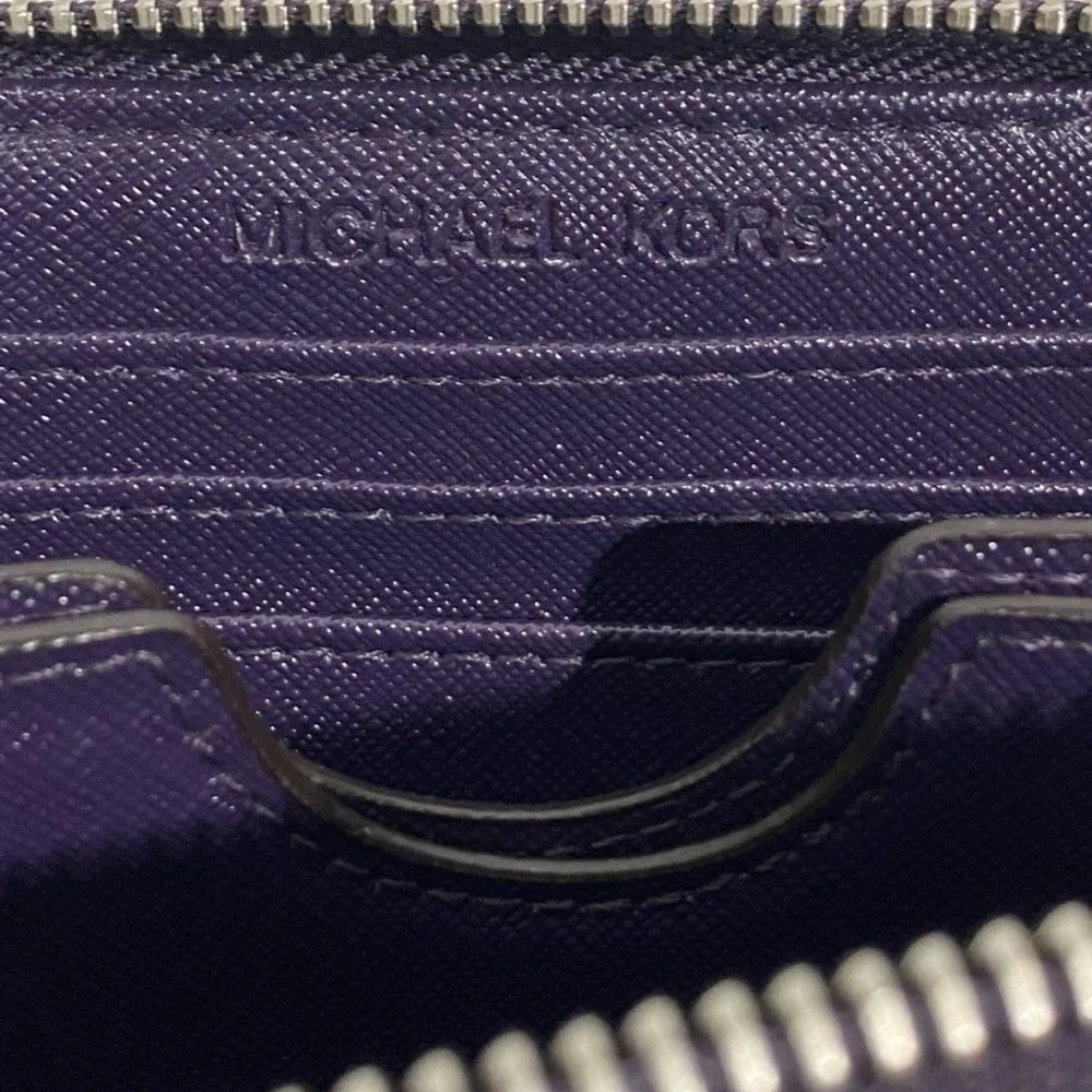 Michael Kors Purple Textured Clutch Wristlet.